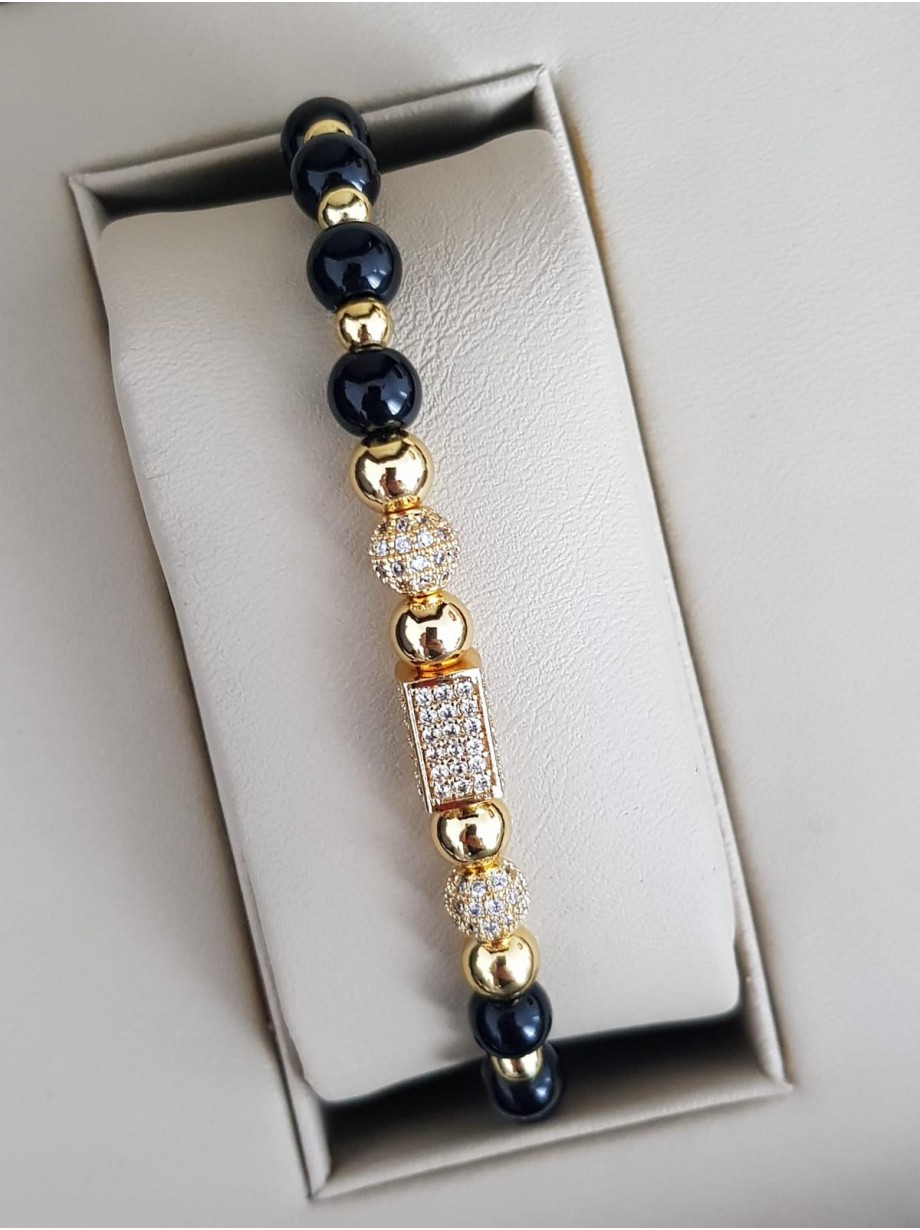 Bratara dama model deosebit cu margele aurii si negre si forme cu pietricele stralucitoare