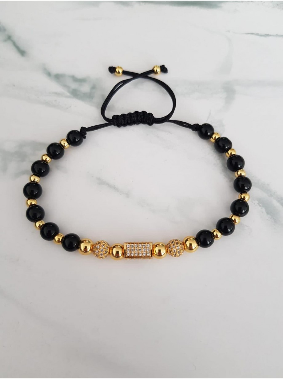 Bratara dama model deosebit cu margele aurii si negre si forme cu pietricele stralucitoare