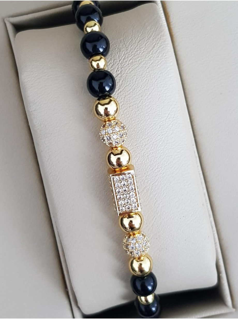 Bratara dama model deosebit cu margele aurii si negre si forme cu pietricele stralucitoare