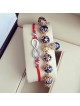 Set 2 Bratari Elegante infinit cu snur rosu si margele bleumarin cu detalii aurii 