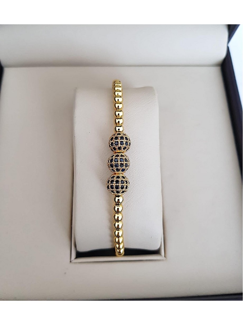 Bratara dama aurie model deosebit cu 3 margele aurii si pietricele negre