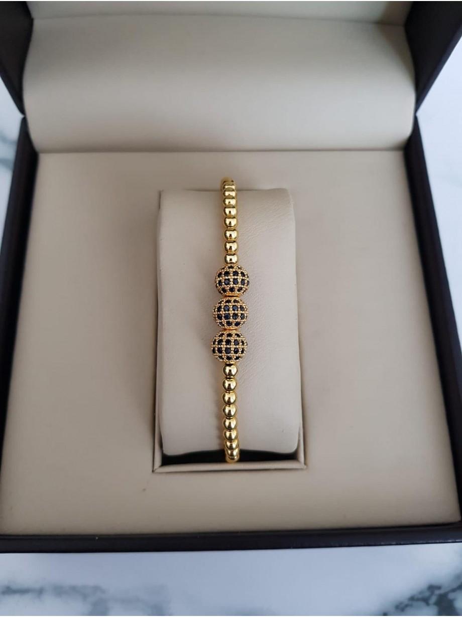 Bratara dama aurie model deosebit cu 3 margele aurii si pietricele negre