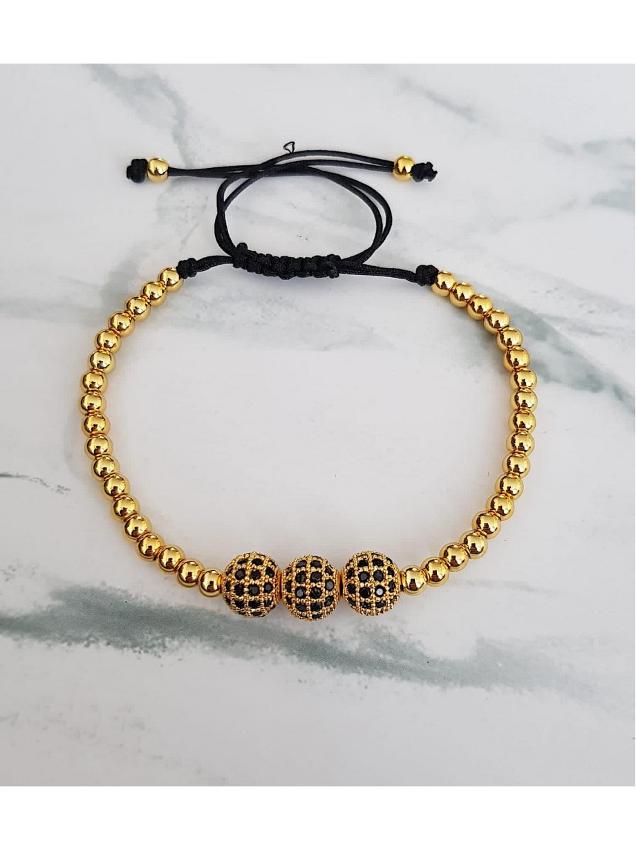 Bratara dama aurie model deosebit cu 3 margele aurii si pietricele negre
