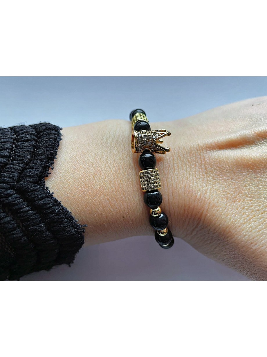 Bratara dama model deosebit cu margele aurii si negre si coroana cu pietricele negre