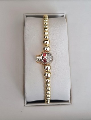 Bratara dama model deosebit cu margele aurii si skull cu pietricele stralucitoare