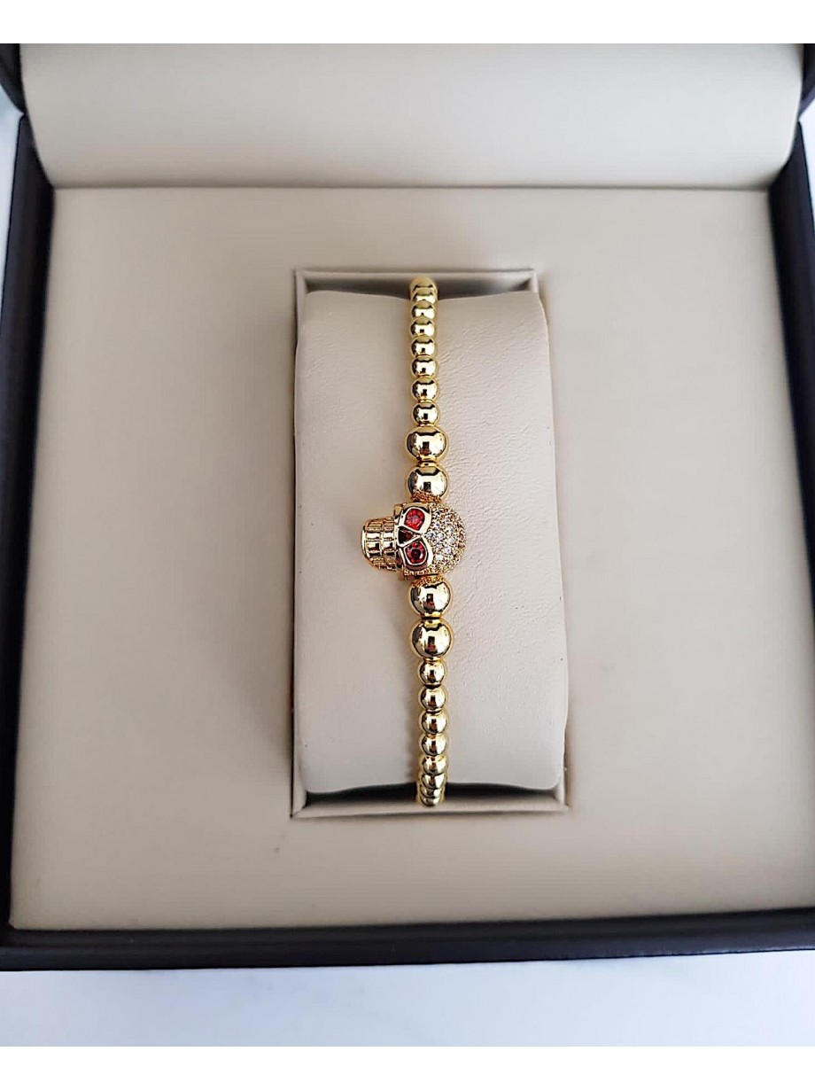 Bratara dama model deosebit cu margele aurii si skull cu pietricele stralucitoare