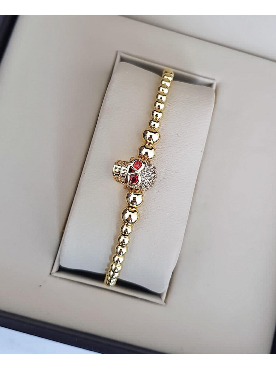 Bratara dama model deosebit cu margele aurii si skull cu pietricele stralucitoare