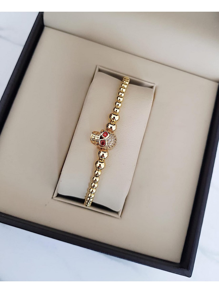 Bratara dama model deosebit cu margele aurii si skull cu pietricele stralucitoare