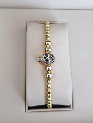 Bratara dama model deosebit cu margele aurii si skull cu pietricele negre