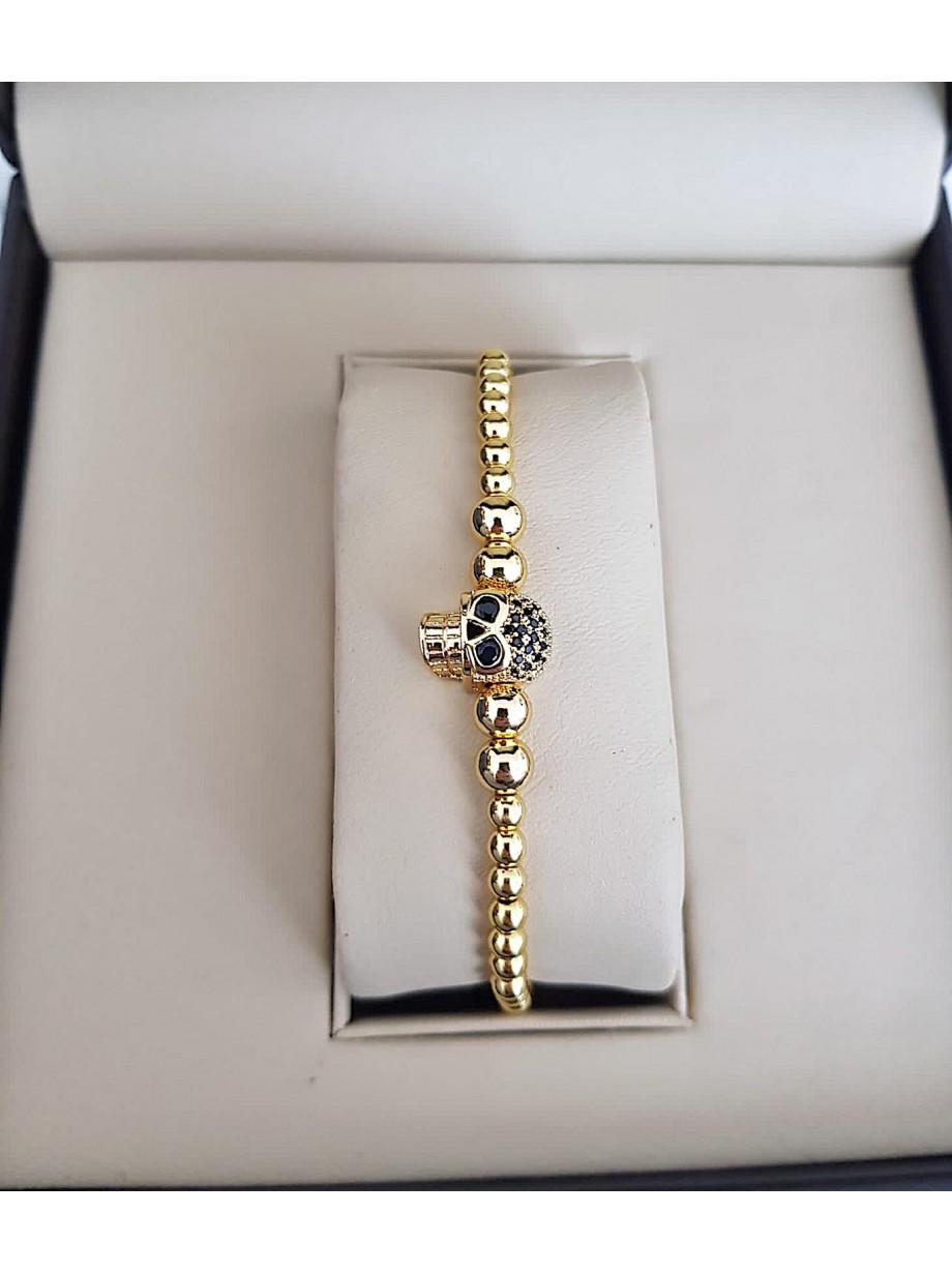 Bratara dama model deosebit cu margele aurii si skull cu pietricele negre