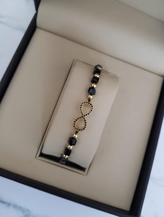 Bratara dama model deosebit cu margele negre si infinit cu pietricele stralucitoare