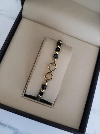 Bratara dama model deosebit cu margele negre si infinit cu pietricele stralucitoare