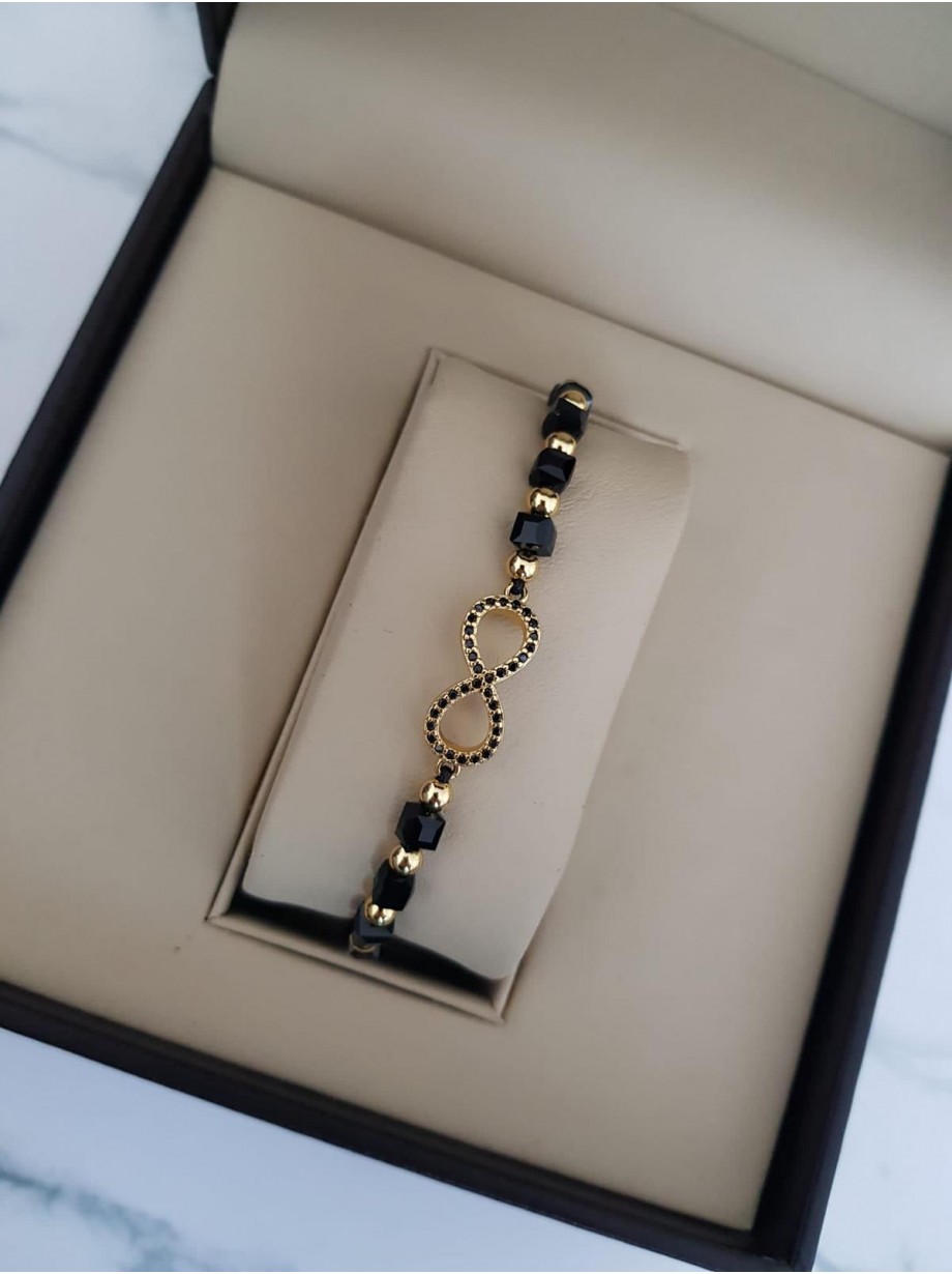 Bratara dama model deosebit cu margele negre si infinit cu pietricele stralucitoare