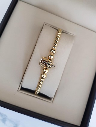 Bratara dama model deosebit cu margele auriii si avion cu pietricele negre