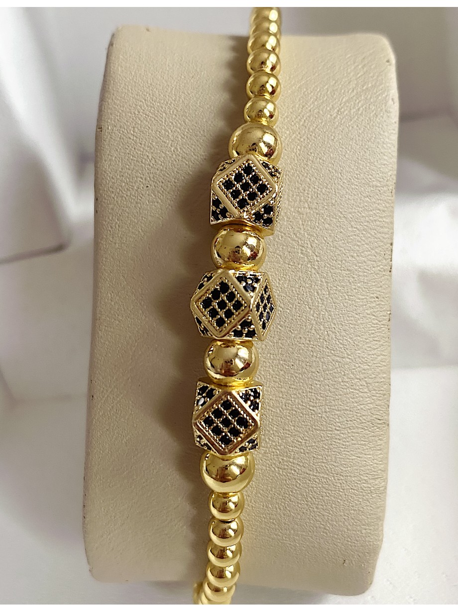 Bratara dama model deosebit cu margele aurii si 3 romburi cu pietricele negre