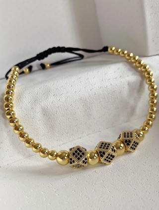 Bratara dama model deosebit cu margele aurii si 3 romburi cu pietricele negre