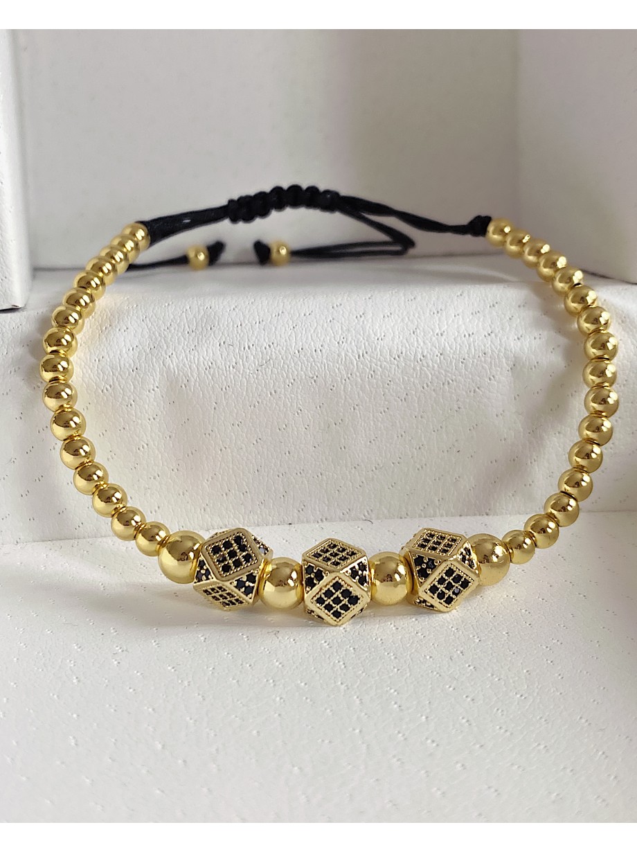 Bratara dama model deosebit cu margele aurii si 3 romburi cu pietricele negre