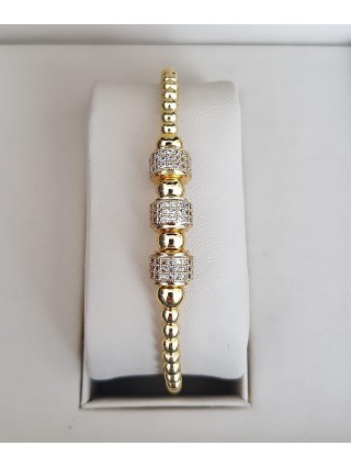 Bratara dama model deosebit cu margele aurii si cercuri cu pietricele stralucitoare