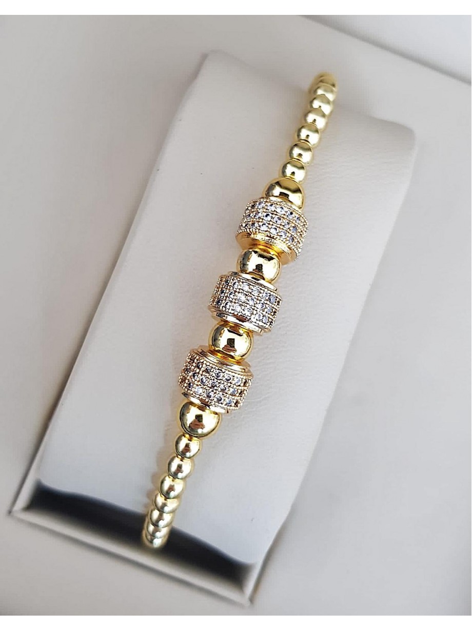 Bratara dama model deosebit cu margele aurii si cercuri cu pietricele stralucitoare