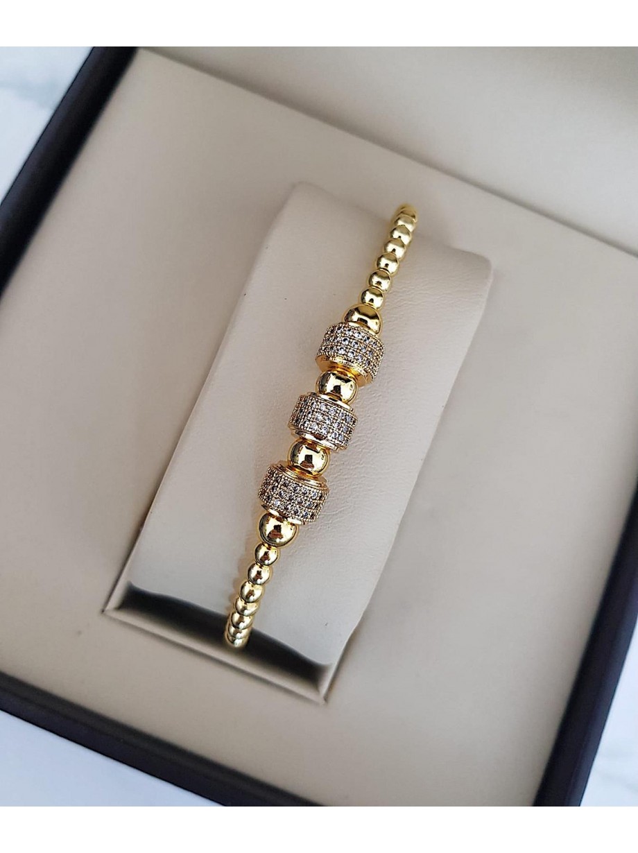 Bratara dama model deosebit cu margele aurii si cercuri cu pietricele stralucitoare