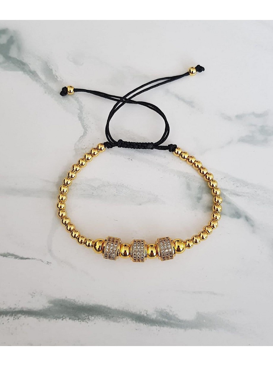 Bratara dama model deosebit cu margele aurii si cercuri cu pietricele stralucitoare