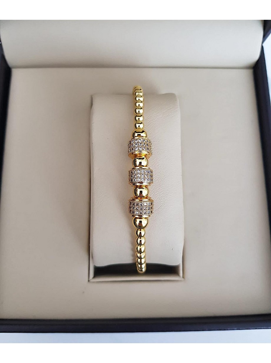 Bratara dama model deosebit cu margele aurii si cercuri cu pietricele stralucitoare