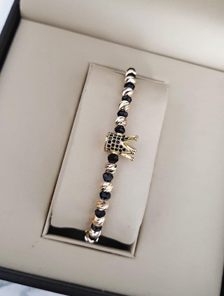 Bratara dama model deosebit cu margele aurii si negre si coroana cu petricele negre