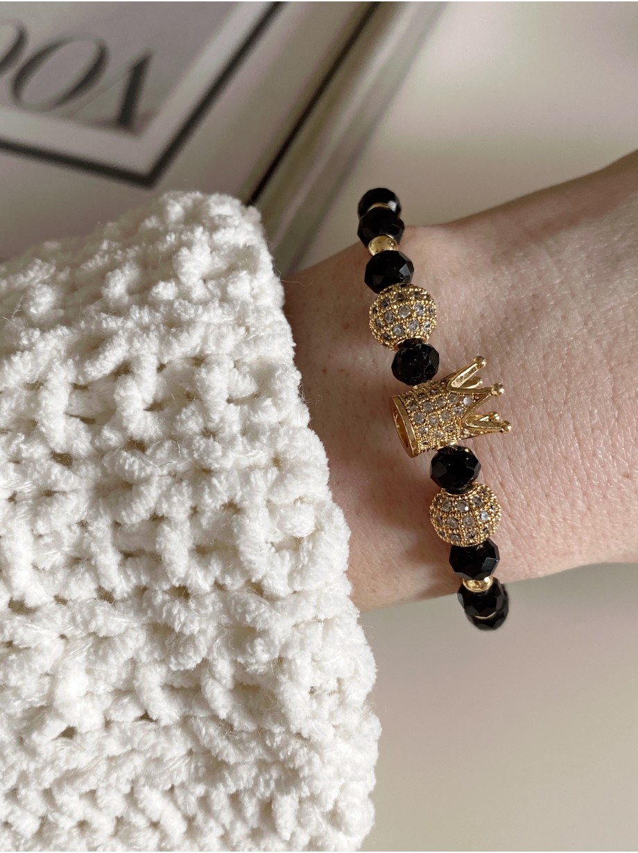 Bratara dama model deosebit cu margele aurii si negre si coroana cu pietricele albe