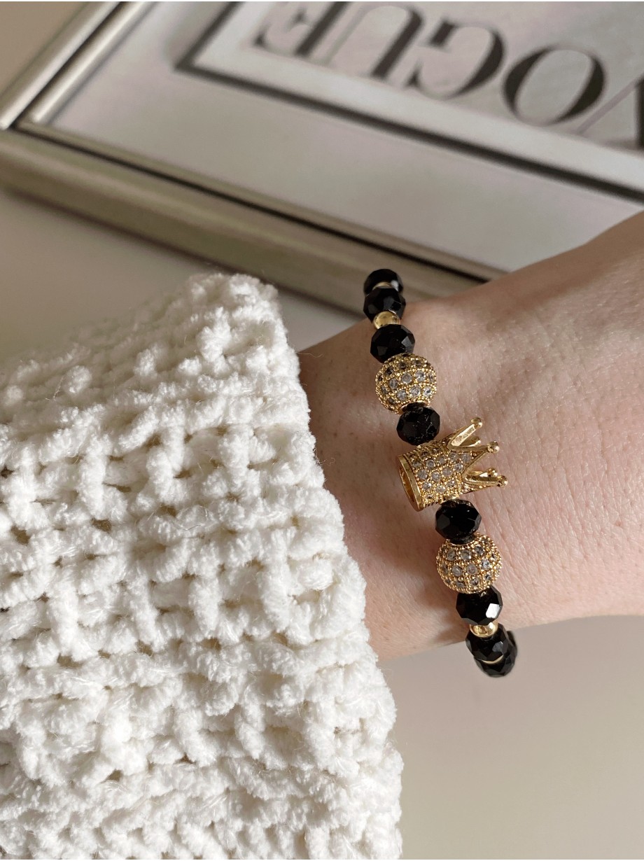 Bratara dama model deosebit cu margele aurii si negre si coroana cu pietricele albe