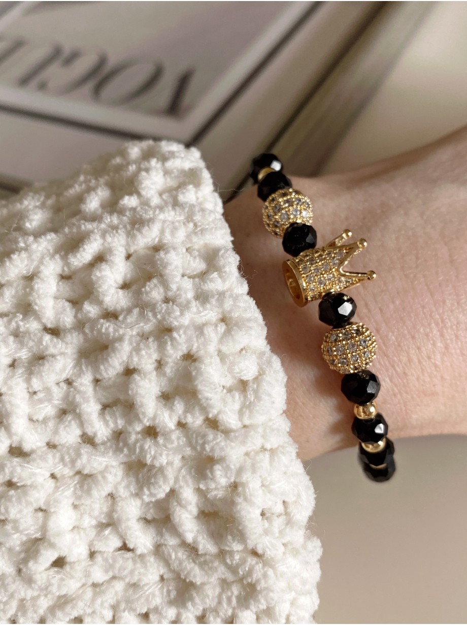 Bratara dama model deosebit cu margele aurii si negre si coroana cu pietricele albe