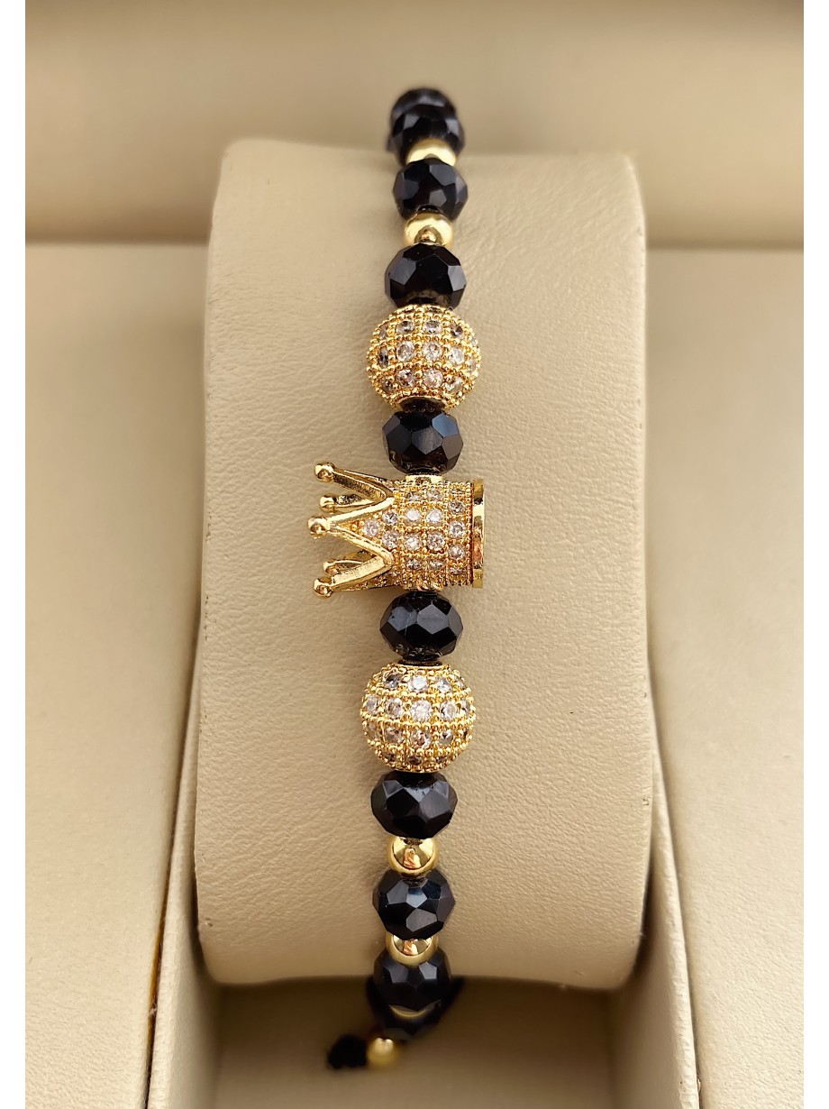 Bratara dama model deosebit cu margele aurii si negre si coroana cu pietricele albe