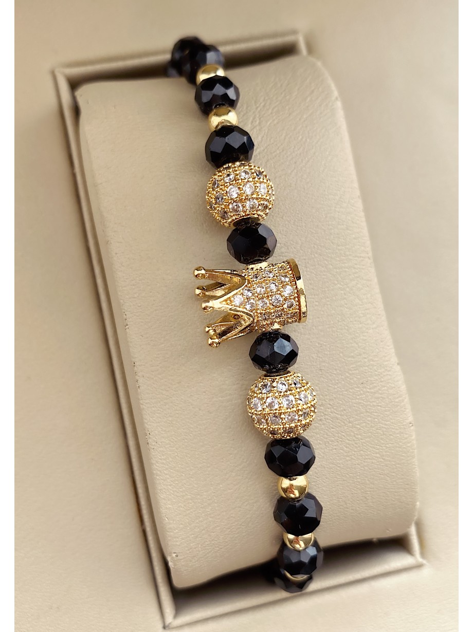 Bratara dama model deosebit cu margele aurii si negre si coroana cu pietricele albe