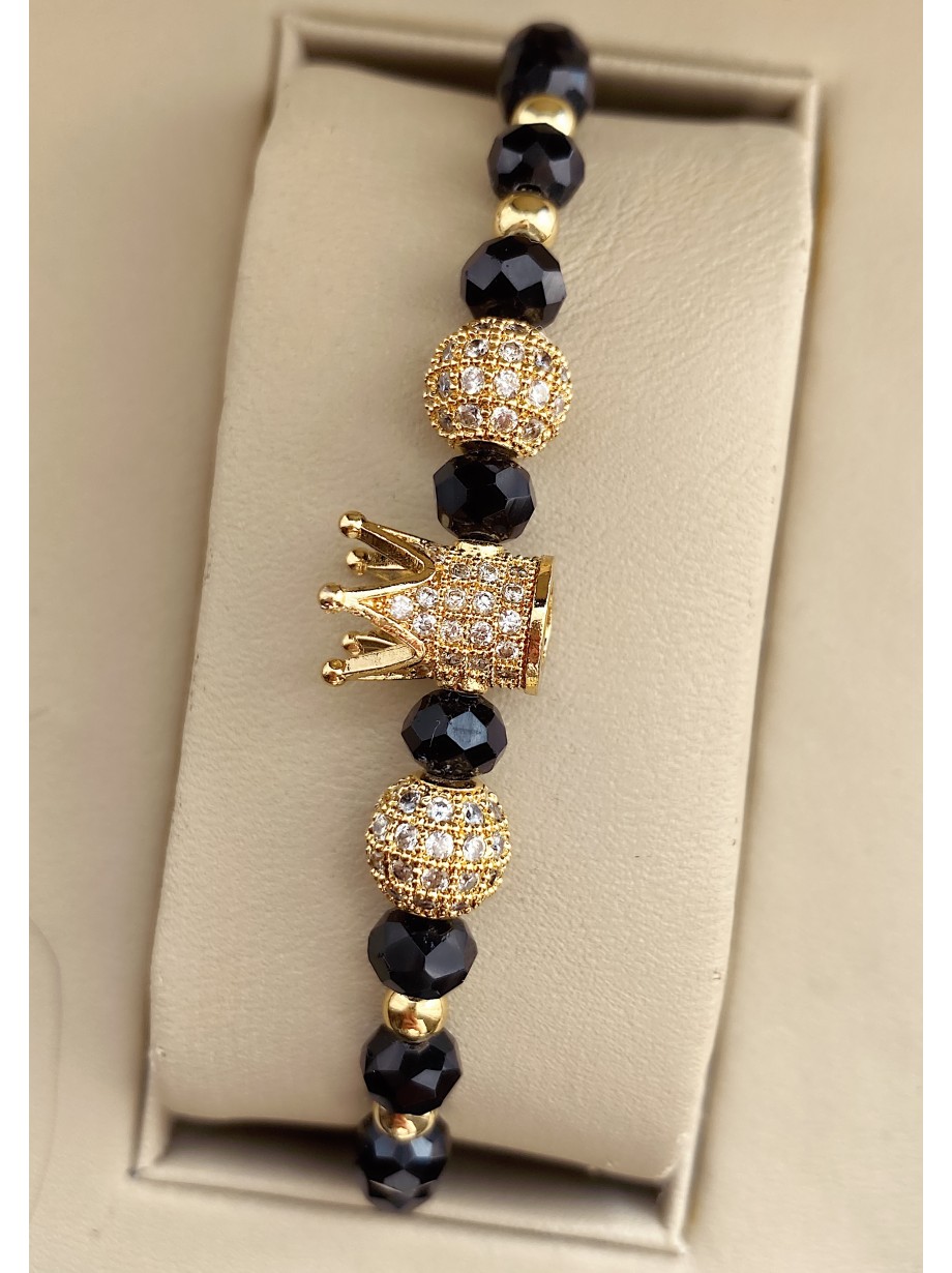Bratara dama model deosebit cu margele aurii si negre si coroana cu pietricele albe