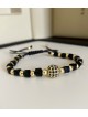 Bratara dama model deosebit cu margele negre si biluta cu pietricele negre