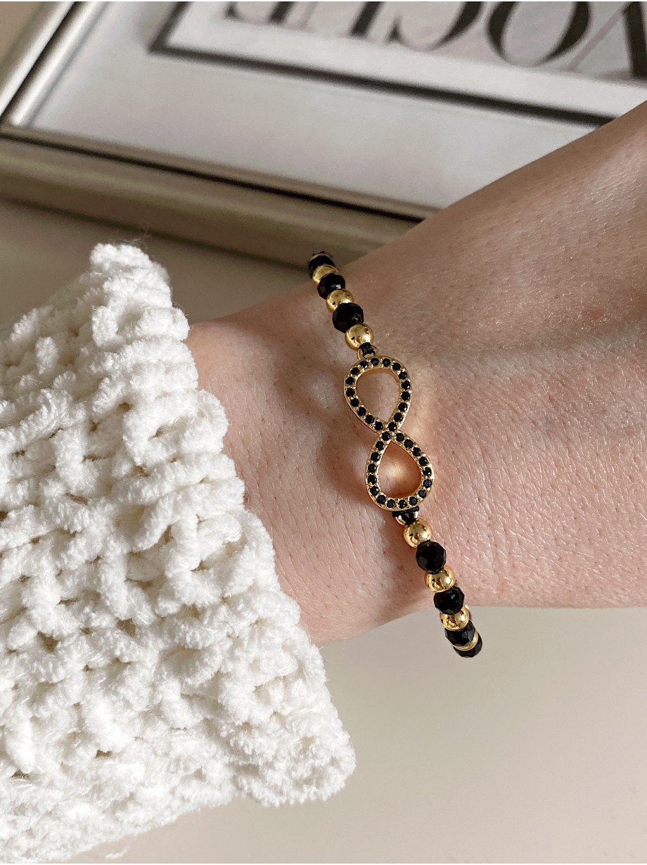 Bratara dama model deosebit cu margele negre si infinit cu pietricele stralucitoare