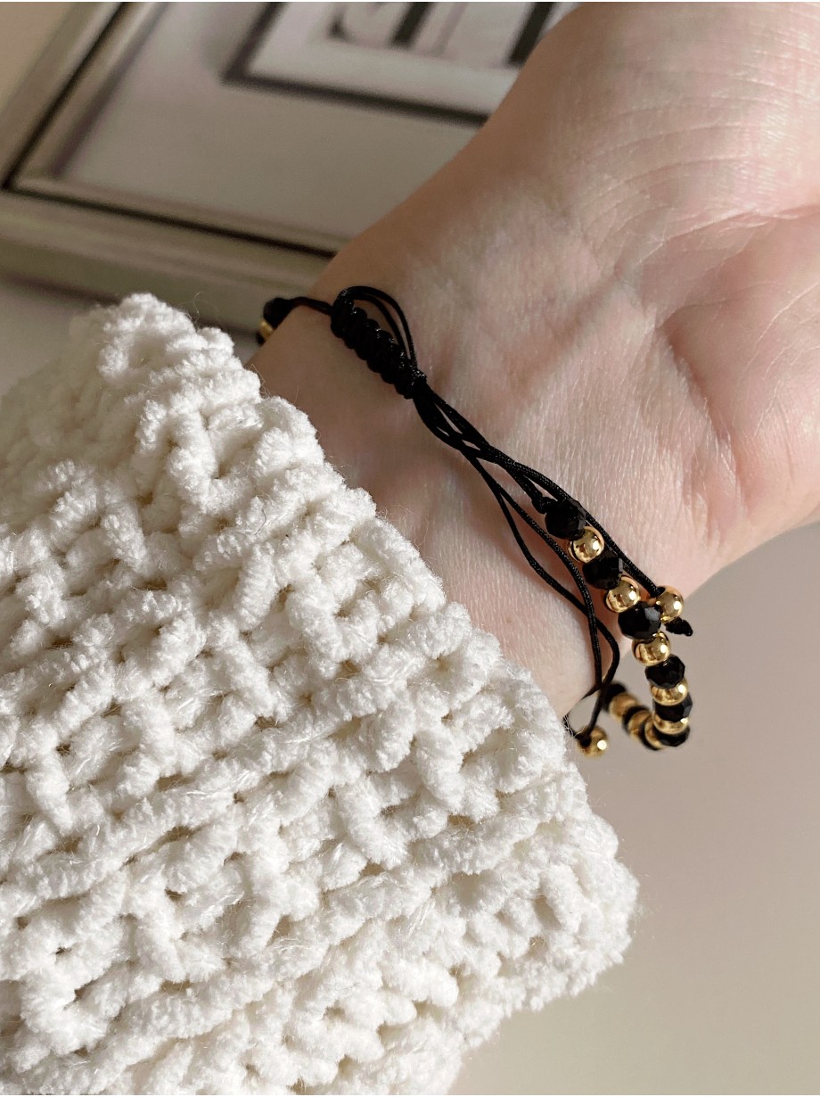 Bratara dama model deosebit cu margele negre si infinit cu pietricele stralucitoare