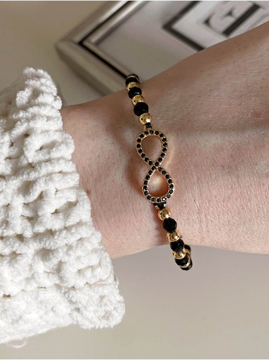 Bratara dama model deosebit cu margele negre si infinit cu pietricele stralucitoare