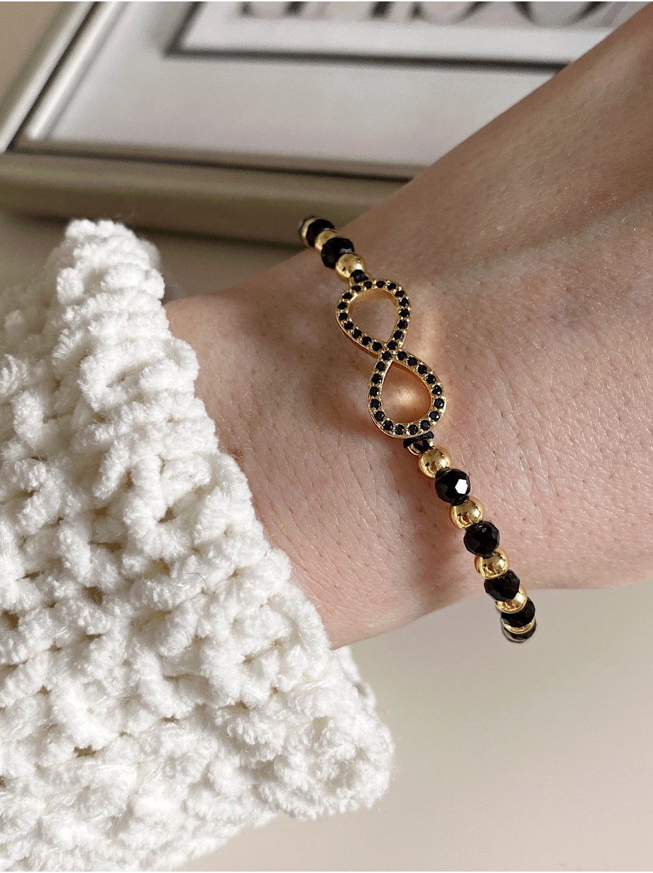 Bratara dama model deosebit cu margele negre si infinit cu pietricele stralucitoare