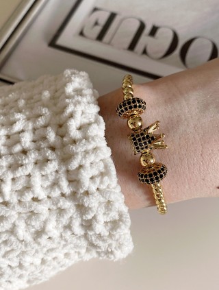 Bratara dama model deosebit cu margele aurii si coroana cu pietricele negre