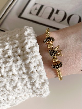 Bratara dama model deosebit cu margele aurii si coroana cu pietricele negre