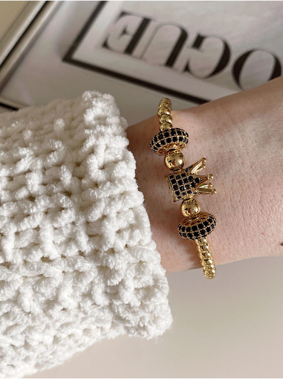 Bratara dama model deosebit cu margele aurii si coroana cu pietricele negre