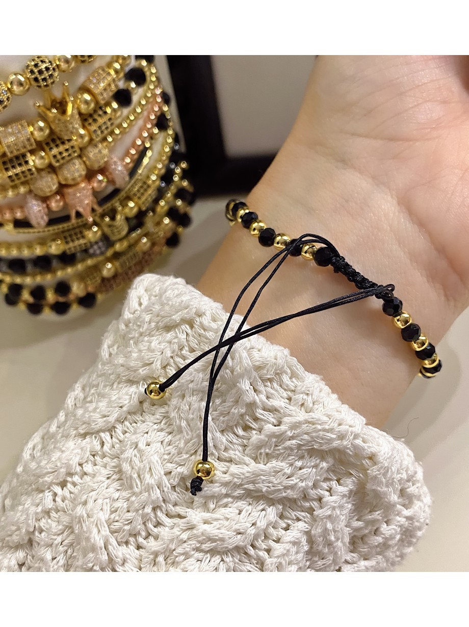 Bratara dama model deosebit cu margele negre si cruce cu pietricele negre