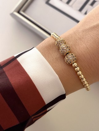 Bratara dama aurie model deosebit cu 3 margele aurii si pietricele albe