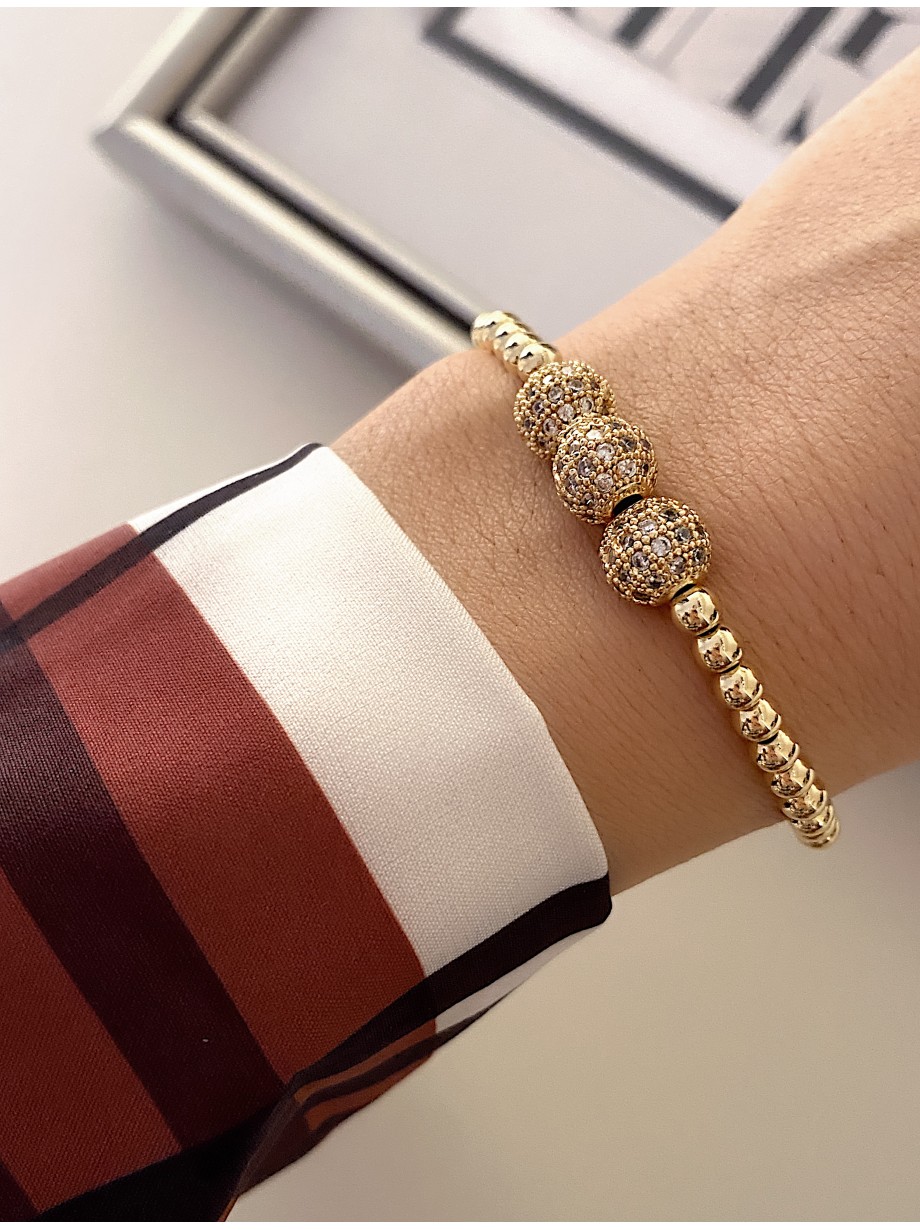 Bratara dama aurie model deosebit cu 3 margele aurii si pietricele albe