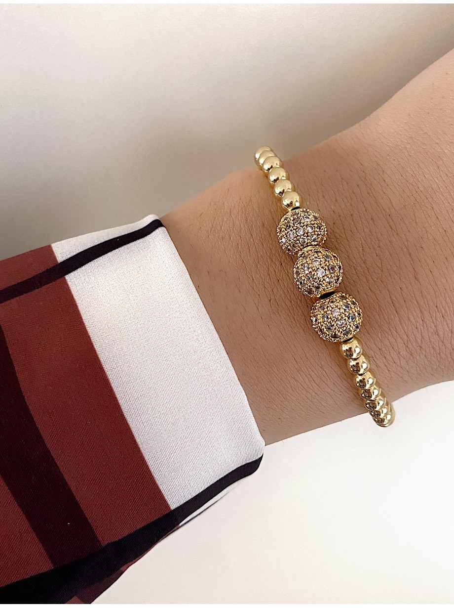 Bratara dama aurie model deosebit cu 3 margele aurii si pietricele albe