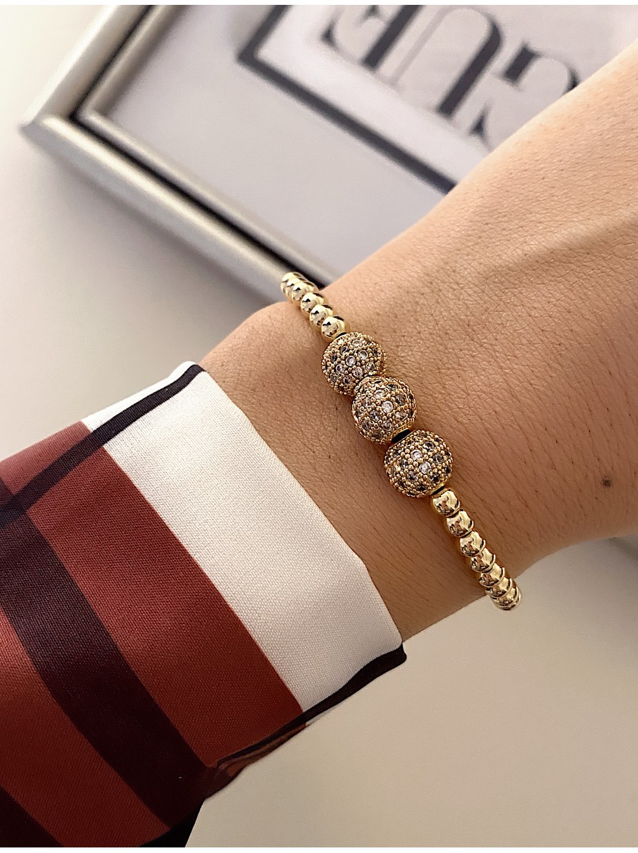 Bratara dama aurie model deosebit cu 3 margele aurii si pietricele albe