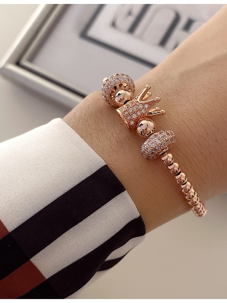 Bratara dama model deosebit cu margele roz si coroana cu pietricele stralucitoare