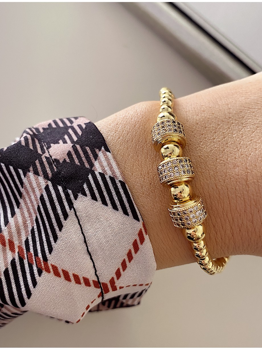 Bratara dama model deosebit cu margele aurii si cercuri cu pietricele stralucitoare