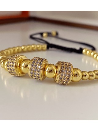 Bratara dama model deosebit cu margele aurii si cercuri cu pietricele stralucitoare