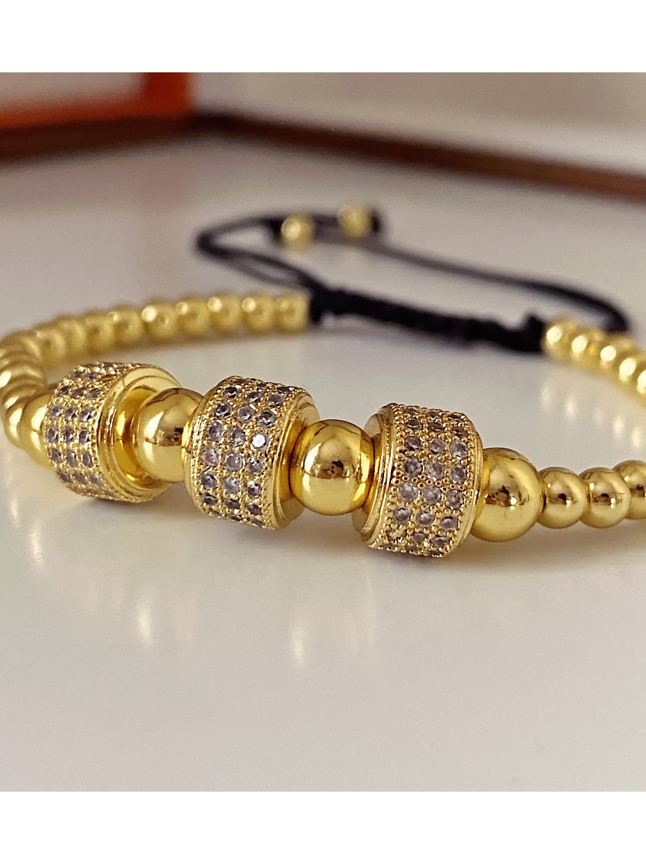 Bratara dama model deosebit cu margele aurii si cercuri cu pietricele stralucitoare